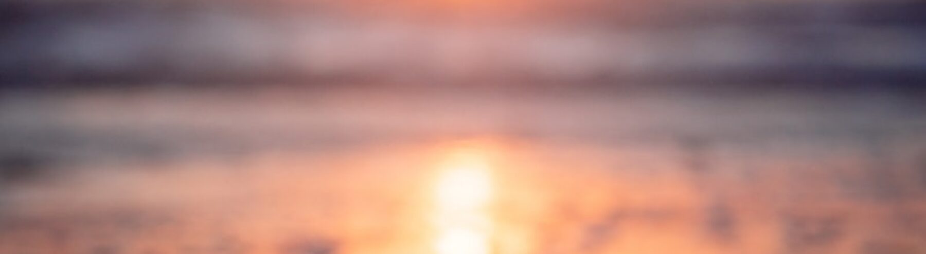 reflection of sunset on beachshore
